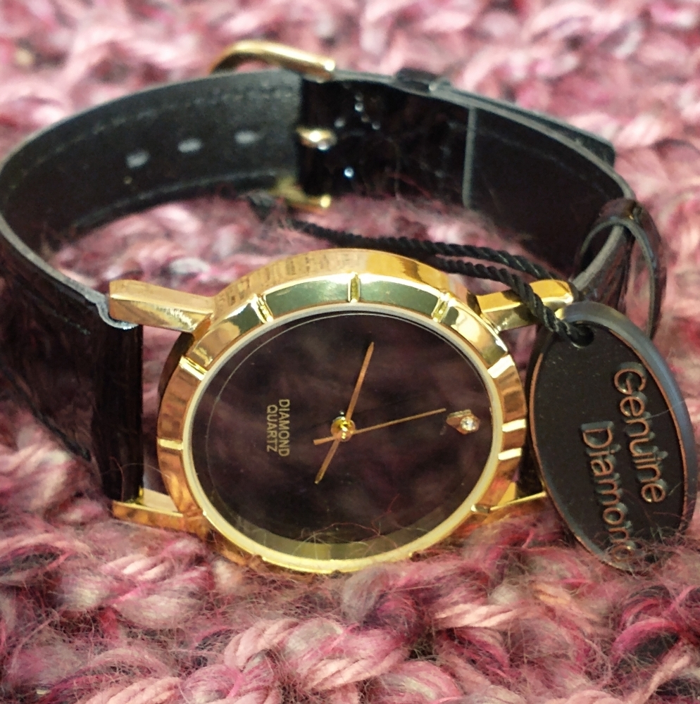 Woman's Black/Gold Watch